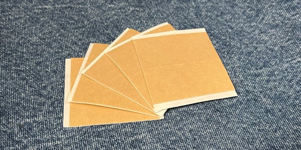 Kiss cut parts made by an adhesive converter