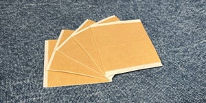 Kiss cut parts made by an adhesive converter