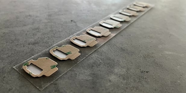 Double sided tape parts cut by a converter 