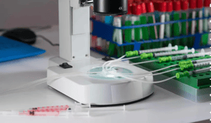 Microfluids being examined under a microscope